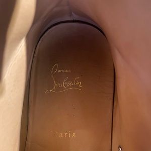 Christian Louboutin red spiked shoes